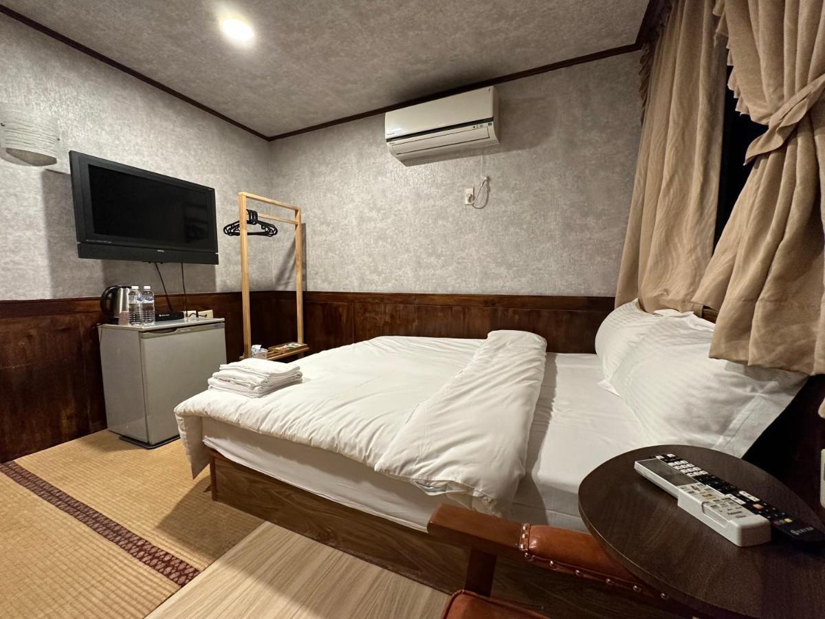 ג'יאושי Ming Ren Hotspring Hotel מראה חיצוני תמונה